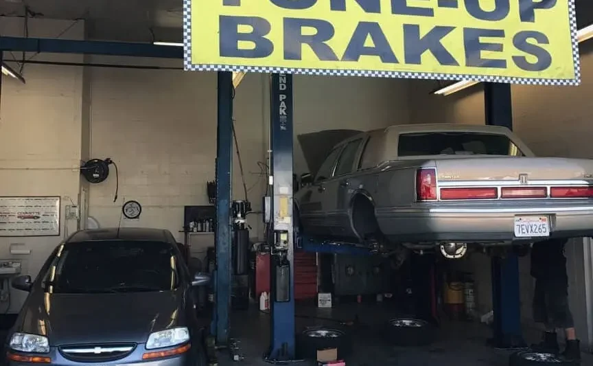 Technician performing brake repair service in Agoura Hills CA